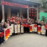 四十書畫家揮墨寫揮春贈街坊